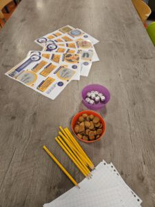 ouderavond mr activiteitencommissie ouderraad spelend leren kinderen rekenspelletjes school inspirerende spreker praktijk